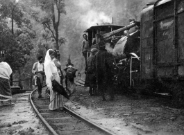 Darjeeling Himalayan Railway (DHR) B Class 2 ft. saddle tank steam locomotive in the mountains, on winding track.