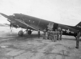 A C-47 transport of the ATC, tail #476342, on pavement at an airbase in in Burma during WWII.