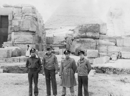 Flyers pose in front of pyramid and Sphinx in Egypt while in transit during WWII. Walter Wegner, 10th Air Force, 7th Bombardment Group, 9th Bombardment Squadron, on far left.