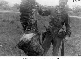 Martin H. McGuffin "Mac with sparrow."  In India or China. 10th Air Force, 7th Bombardment Group, 9th Bombardment Squadron.  During WWII.
