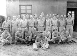 Possibly personnel of the 9th Bombardment Squadron, 7th Bombardment Group, 10th Air Force. During WWII. With a small Chinese boy. This seems to be the same group as in this image.  Some names:  Barry Diamond. Bronx, New York.  Joe T. Daniels. North Carolina.  "Sam" Isamu S. Higurashi. Seattle, WA. ASN 37716688.  Dan Holland. Chicago, Illinois.  Tom Livingford. Lewistown, PA.  Bill Muir. Concord, New Hampshire.  C. N. Gordon. Seattle, WA.  L. L. Penson. De Queen, Arkansas.  Dom P. Tatangelo. Schenectady, New