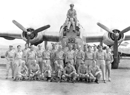 Possibly personnel of the 9th Bombardment Squadron, 7th Bombardment Group, 10th Air Force.  Posing on B-24 bomber, with small Chinese boy. During WWII. This seems to be the same group as in this image.  Some names:  Barry Diamond. Bronx, New York.  Joe T. Daniels. North Carolina.  "Sam" Isamu S. Higurashi. Seattle, WA. ASN 37716688.  Dan Holland. Chicago, Illinois.  Tom Livingford. Lewistown, PA.  Bill Muir. Concord, New Hampshire.  C. N. Gordon. Seattle, WA.  L. L. Penson. De Queen, Arkansas.  Dom P. Tatan