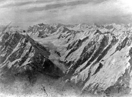 Aerial view of dramatic and unforgiving Himalayas.  22nd Bombardment Squadron, in Burma.