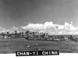 Rice paddies and walled town of Zhanyi, Yunnan, China, during WWII. December, 1944.