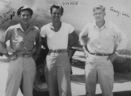 Three flyers pose with B-24 in Burma during 1943.  "Hot Shot CHARLIE," "SNARE," and "Tenny-Lee."  Left to right: Bud Goodman (Chicago), Ned Levey, Ray Henderson (North Carolina).