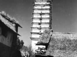 Pagoda in Dali, Yunnan province, China, during WWII. This is one of three pagodas within a single walled compound. The compound a had been appropriated for use by Nationalist troops. Later, after the communist revolution, the compound was also used by troops, but by PLA troops.