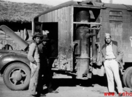 A truck modified to run charcoal. In SW China, during WWII.