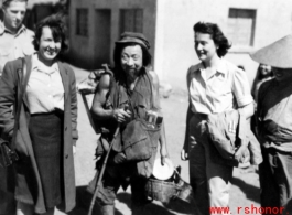 Chinese and Americans Interacting on the street, probably at Yangkai, during WWII.