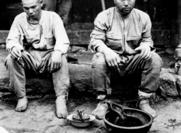 During WWII, two Japanese prisoners captured on Sung Shan Hill by the Chinese. 