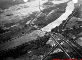 Aerial view of bombed bridge in SW China or French Indochina during WWII.