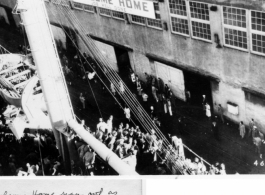 "Welcome home sign out as we dock at Seattle-Tacoma." CBI veterans returning to the US.