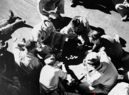GIs gambling on the deck topside on the ship back home to the US after the war.  Photo from John Dale Simmons.