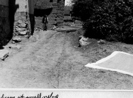 Airing out bedding in small village near Kunming, during WWII.