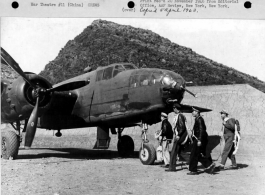 A CACW B-25 crew walks to their bomber at a location in southern China, most likely Guangxi province, readying for a mission. They are:  Lt. K. W. Fang  Capt. W. P. "Kit" Carson,  Capt. C. Y. Lin  Lt. M. H. Chow