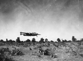 An American B-25 bomber flies at minimum altitude, probably during training/practice of 'low-level attack techniques', for 'skip bombing'. During WWII.