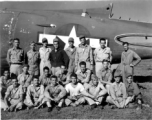 Some American aircraft mechanics and engineers of the 396th Air Service Squadron at Ankang, China, in China during WWII, posing as a group before the partial shell on a C-47 cargo plane that is being used for parts:  First row:  Davis, Clasby, Rush, Anderson, Lt.Chavez, Manuel, Villareal  Second row: Orona, Hoffman, Speer, Clemens, Weidenbener, Hawkins  Third row: Gerdsen, Knecht, Jones, Bowen, Galpen, Szapella, Prock, Mehlenbacher