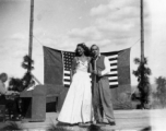 Pat O'Brien's USO troupe performs at an American airbase in China in October 1944--Here  Pat O'Brien and Jinx Falkenburg perform.