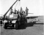 12th Air Service Group mechanics salvage a P-51 fighter in China during WWII.