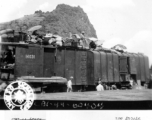 September 27, 1944  During WWII, refugees from Kweilin (Guilin) pack the top of freight cars in the south station, Liuchow, China.  Photo by Lt. N. J. Dain