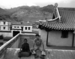 A GI of SACO poses with Lamist monk or trainee at a temple in northern China during WWII.