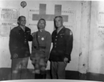 A very emaciated and weary-looking Zheng Tingji (郑庭笈), commander of the 48th Army Division (陆军第四十八师 ), poses at the rally banquet, with two high-ranking US officers. 