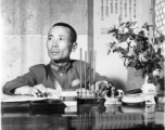  A very emaciated and wary-looking Zheng Tingji (郑庭笈), commander of the 48th Army Division (陆军第四十八师 ), poses at his desk in Yunnan.