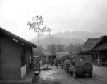 American military convoy goes through a small village in SW China. During WWII.