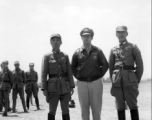 On the left: Zheng Tingji (郑庭笈), commander of the 48th Army Division (陆军第四十八师 ), posing in Yunnan.  Center: Possibly Maj Richard D. Day (李察戴), who was commander of 491st Bombardment Squadron's 19th Liaison Squadron from April 26, 1943, to Sept 1944.  Right: Unknown Chinese officer.  During WWII.