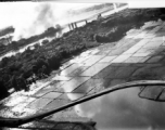 Bombing of Đáp Cầu railway bridge in French Indochina (Vietnam), during WWII. In northern Vietnam, and along a critical rail route used by the Japanese.