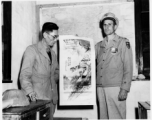 A Chinese representative of the Air Transport Office of the SYEHA WTB presents a picture to commemorate the 38th anniversary of the USAAF to an officer of the ATC at Chanyi, China. During WWII.