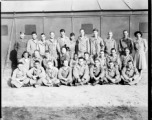 A group of trainees in photography during WWII.  Edward H. Dixon is sitting crossed-legged in the first row, second from the left.