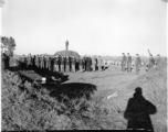 Burials of 1st Lt. John B. Leskie (middle initial corrected), Flight Officer John G. Meuth, 2nd Lt. Lawrence A. Swanson, S/Sgt. Edward Lietener, Sgt. David H. Randolph. All men were members of the 322nd Troop Carrier Squadron. Maj. Gen. Wedemeyer and Maj. Gen. G. X. Cheves were present at the funeral ceremony.  December 16, 1944.  Photo by Pvt. John F. Albert. B-Detachment, 164th Signal Photographic Company, APO 627.