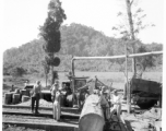 797th Engineer Forestry Company mill in Burma, cutting beams for bridge building along the Burma Road.  During WWII.