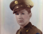 John Gerber in uniform and with Army Air Forces WWII Shoulder Patch, in hand-colored image.