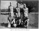 B-25 crew poses in field.   Dave Hayward, Wayne Craven, Frank McKenna, Les Norris, Dale Miller, Elwood Slayton.  22nd Bombardment Squadron, in the CBI.