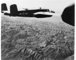 View from B-25s of the 22nd Bombardment Squadron in flight over SW China, Indochina, or Burma during WWII--Happy for the rare escort by P-38s and P-51s.