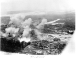 Low altitude bombing at Van Trai Marshalling yards, in Tourane (now Da Nang), French Indochina.  22nd Bombardment Squadron.