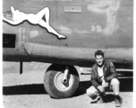 Flyer kneeling with F-7A "Rice Pattie Hattie." 24th Combat Mapping Squadron, 8th Photo Reconnaissance Group, 10th Air Force