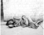 Mother and child victims of famine in India, during WWII.