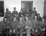 Festive GIs pose in a group in the CBI during WWII. Kenneth Williams is second from right in front row. 