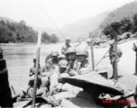 Chinese and American troops on a river in Yunnan province, China, during WWII.