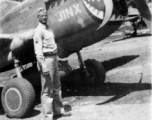 Kenneth Williams in Kunming with a fanged P-40 named 'Jinx'.