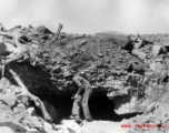 A battle-blasted bunker or pillbox in China, probably in Tengchong, during WWII.