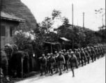 Chinese troops marching, probably at Liuzhou, Guangxi. During WWII.