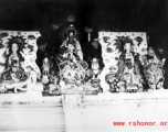 Figures inside a Buddhist temple in China. During WWII.