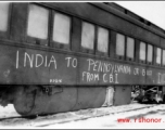 A train home in India, with the declaration "India to Pennsylvania or bust." After end of hostilities.