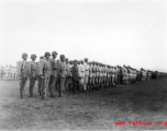 Chinese soldiers standing in ranks during exercises in southern China, probably Yunnan province, or possibly in Burma.