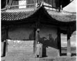A VIP Chinese woman poses at a pavilion in Songming county during a day outing. During WWII.