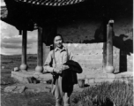 A VIP Chinese man poses before a pavilion in Songming county during WWII.