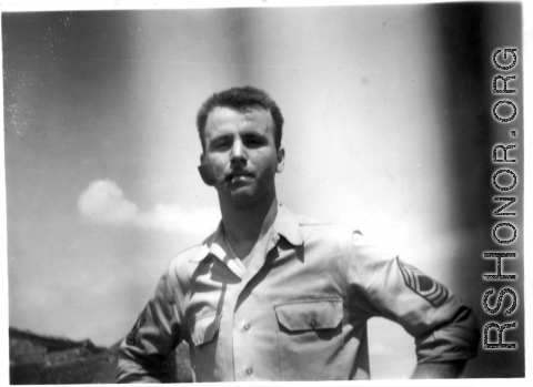 Elmer Bukey smoking a pipe in China during WWII.